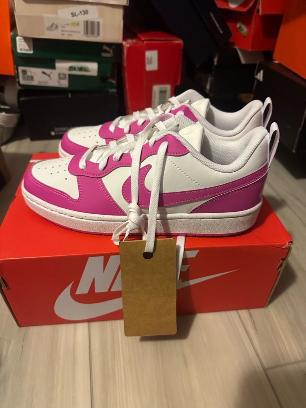 Nike Low-Top Sneakers in White & Pink